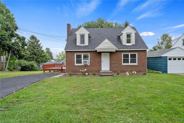 cape cod-style house featuring a front lawn and a deck