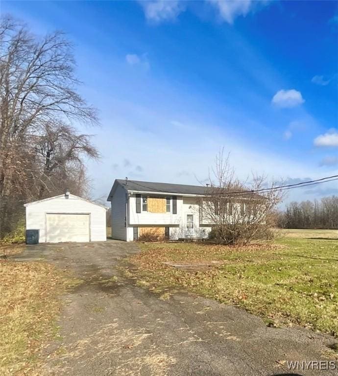 split foyer home with an outbuilding