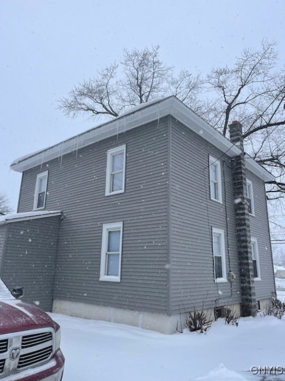 view of snow covered property