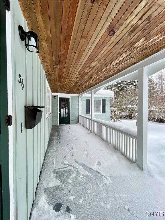 view of snow covered patio