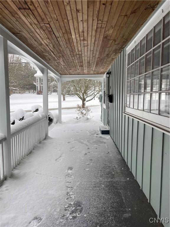 view of snow covered patio