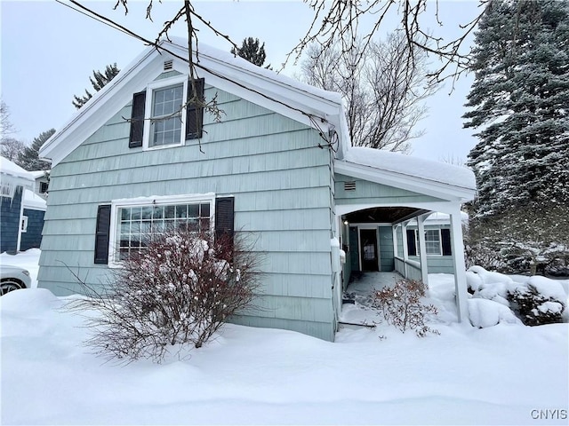 view of snow covered property