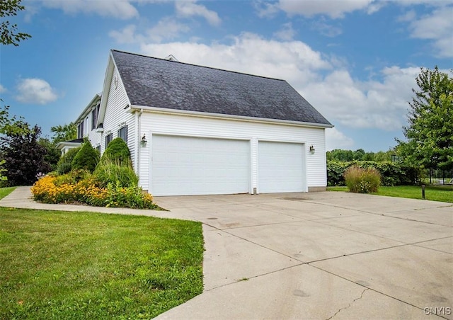 view of side of home with a lawn