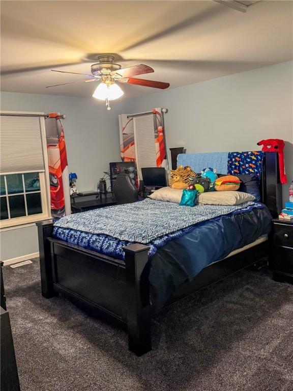 bedroom with carpet and ceiling fan