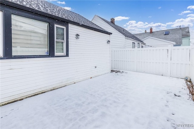 view of yard covered in snow