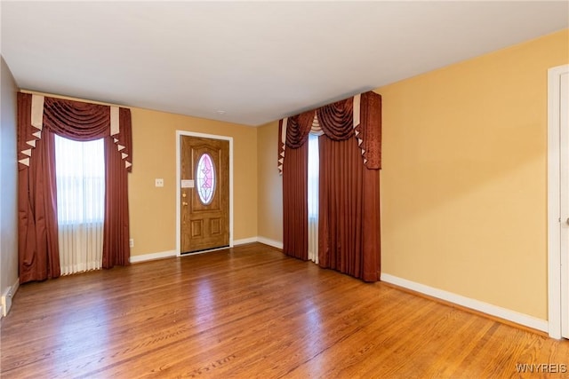 entrance foyer featuring hardwood / wood-style flooring