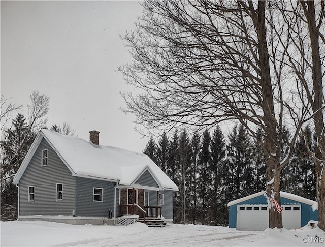 exterior space featuring an outbuilding and a garage