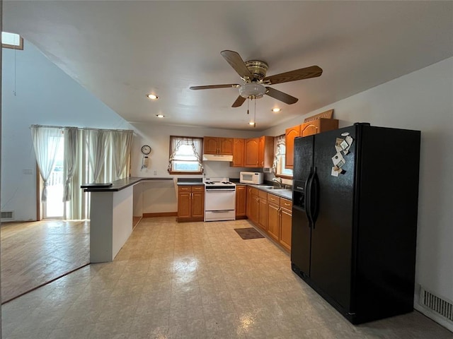 155 Puckerville, Oxford, NY 13733 - kitchen with white appliances, ceiling fan, and sink