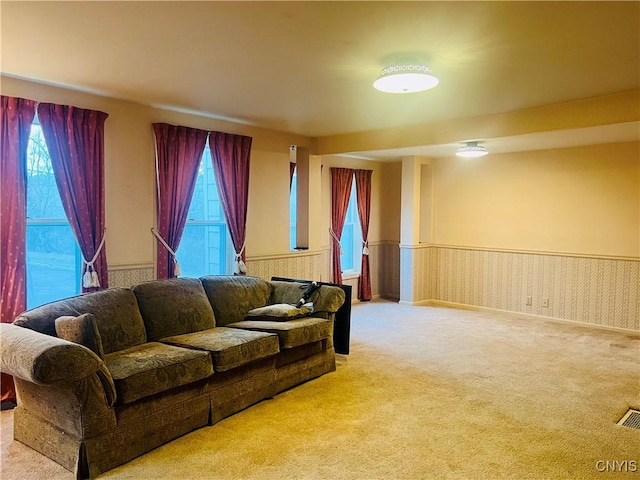 living room with light colored carpet