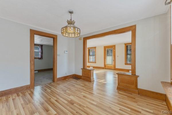 empty room with light wood-type flooring