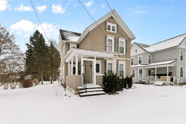 view of snow covered property