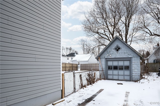 view of snow covered garage