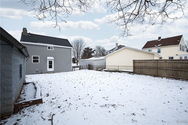 view of yard covered in snow