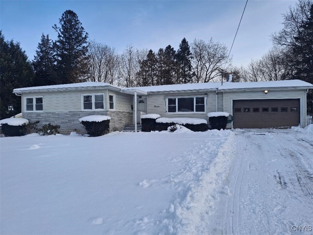 single story home with a garage