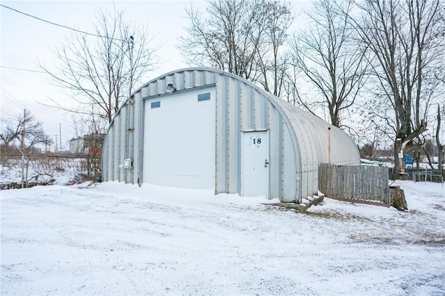 view of snow covered garage