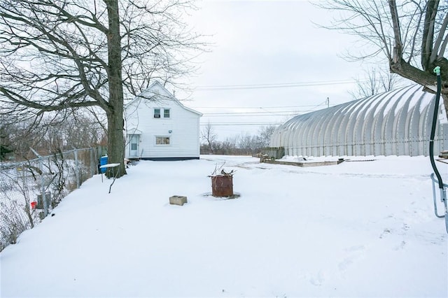 view of yard covered in snow