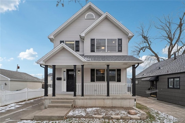 view of property with covered porch