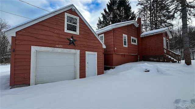 exterior space with a garage