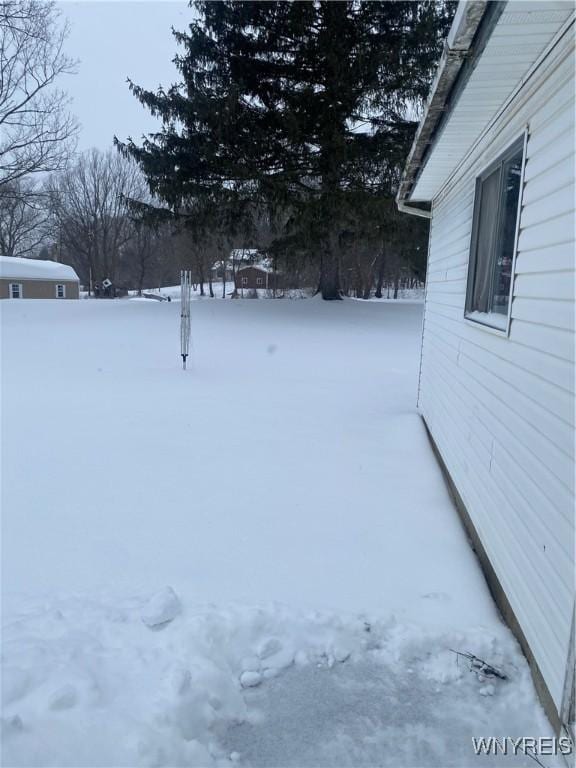 view of snowy yard