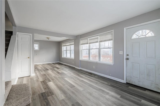 foyer with light wood-type flooring