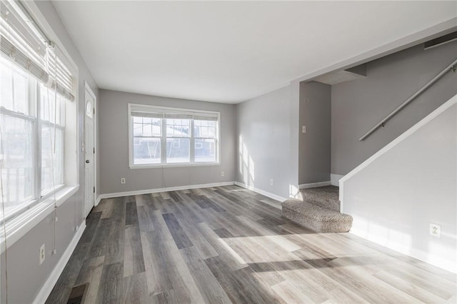 empty room featuring wood-type flooring