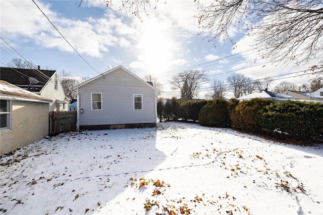 view of snow covered property