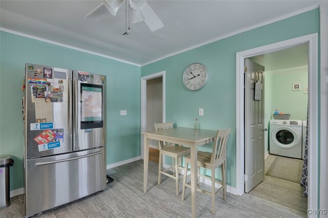 dining space with light hardwood / wood-style floors, ceiling fan, and crown molding