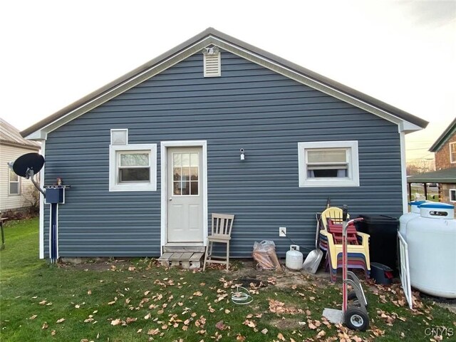 43804 Second St, Alexandria, NY 13679 - back of house featuring a yard and entry steps