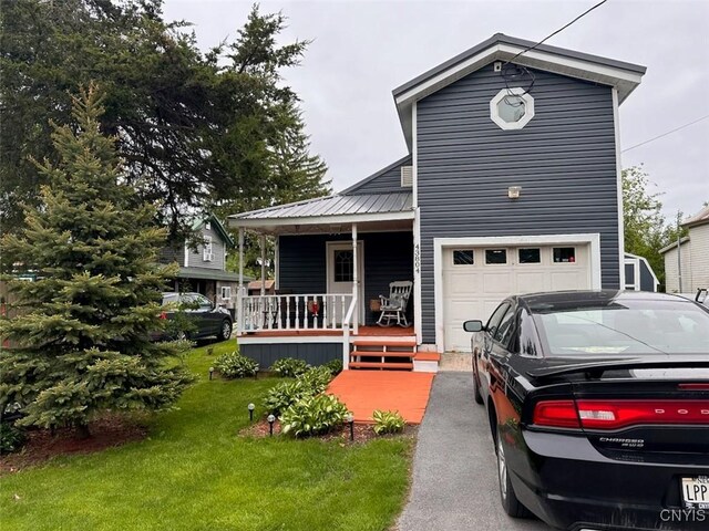 43804 Second St, Alexandria, NY 13679 - view of front of house with covered porch and a front yard
