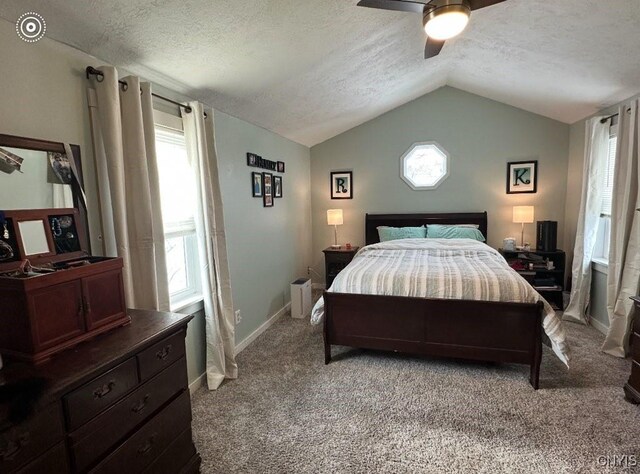 43804 Second St, Alexandria, NY 13679 - bedroom with a textured ceiling, light colored carpet, lofted ceiling, multiple windows, and a ceiling fan