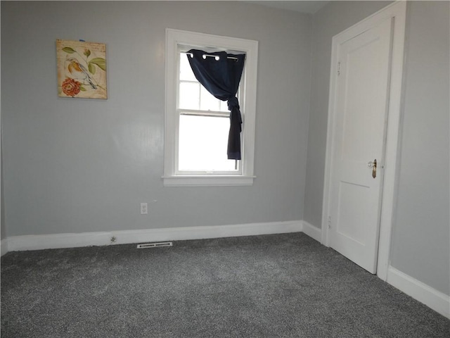 view of carpeted spare room