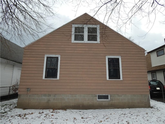 view of snow covered property