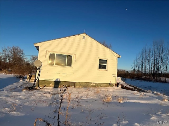 view of snow covered property