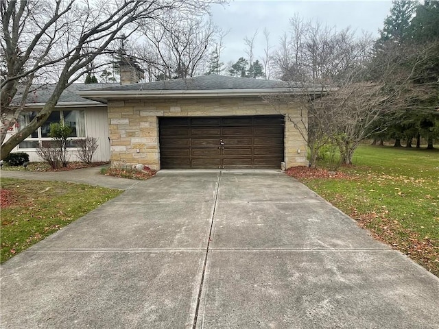 garage with a yard