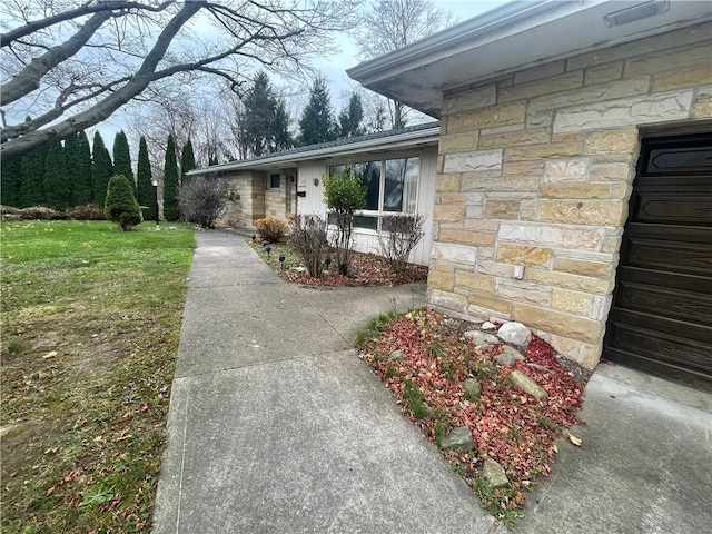 exterior space featuring a front lawn