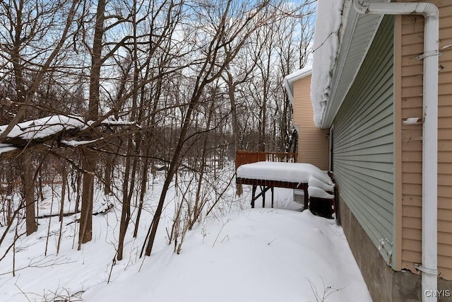 view of yard covered in snow