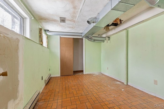 basement with a baseboard radiator