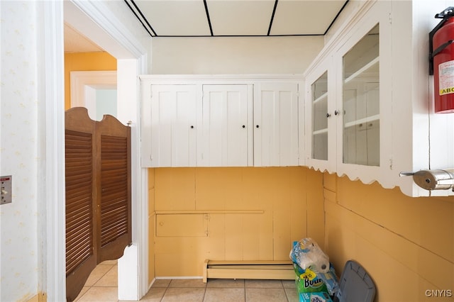 storage room featuring a baseboard radiator