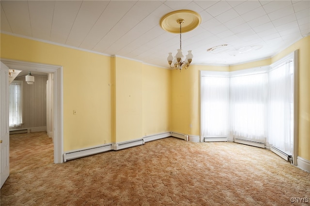 carpeted empty room featuring baseboard heating, ornamental molding, and an inviting chandelier