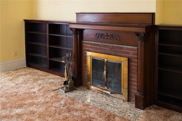 details featuring carpet flooring and a brick fireplace