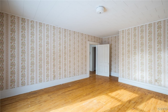 empty room featuring hardwood / wood-style flooring