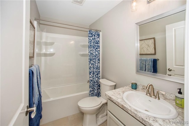 full bathroom with vanity, toilet, and shower / bath combo with shower curtain