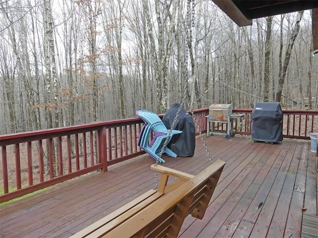 wooden deck with area for grilling