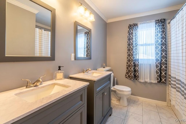 bathroom featuring vanity, toilet, and crown molding