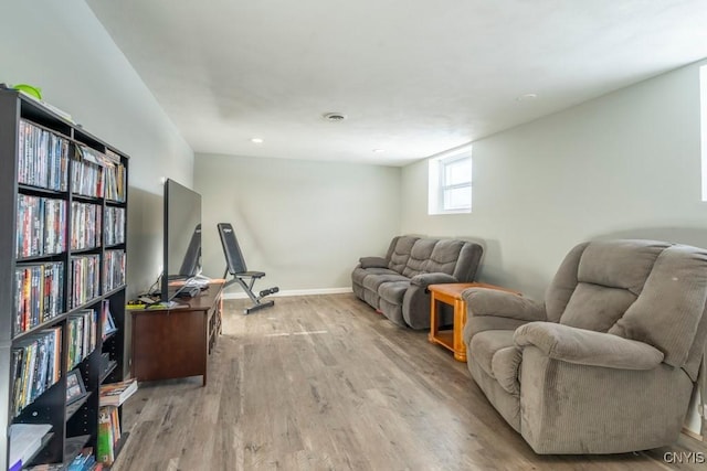 living area featuring light hardwood / wood-style floors