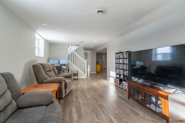 living room with hardwood / wood-style flooring