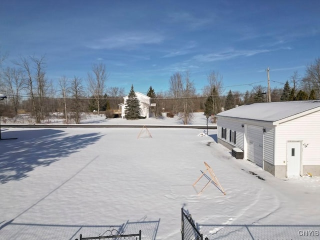 view of yard covered in snow