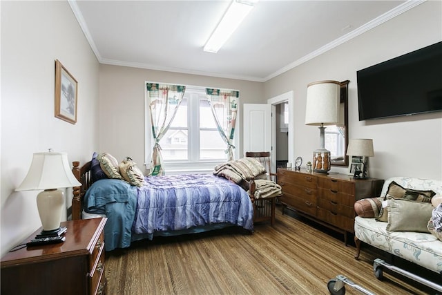 bedroom featuring crown molding