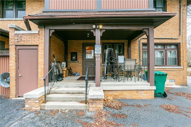 entrance to property with covered porch