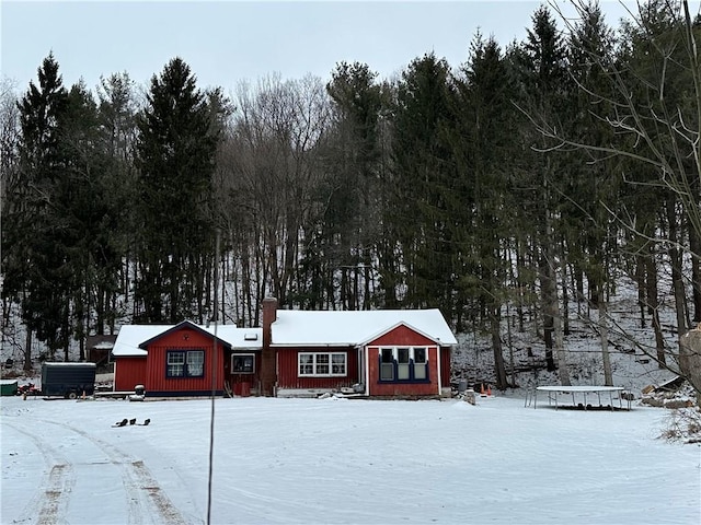 view of front of property with a trampoline